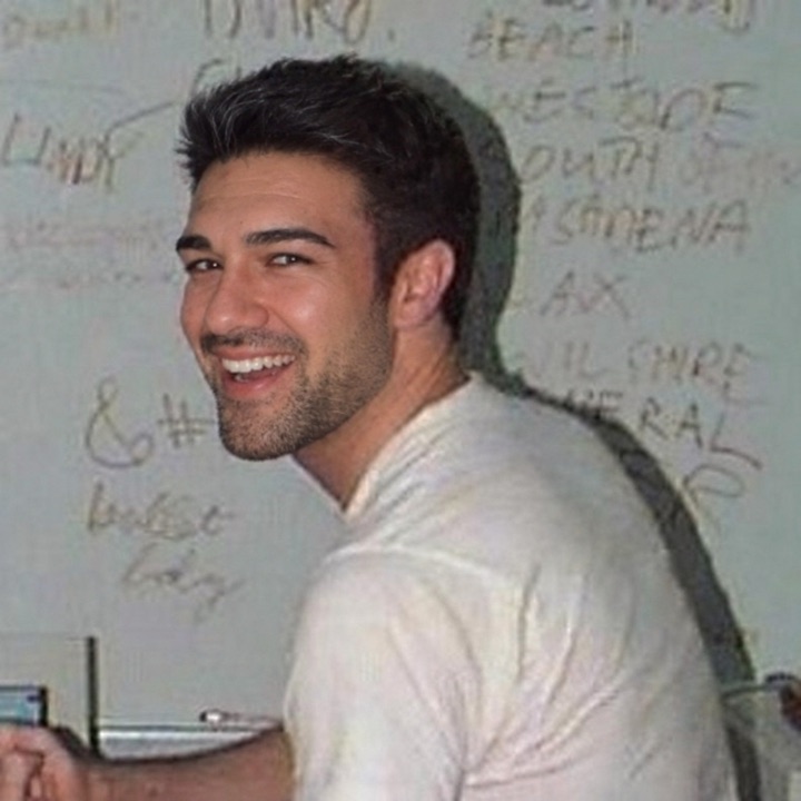 Jesse, founder of Wallflower, smiling at the camera